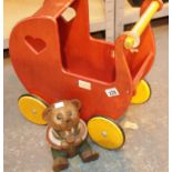 Childs wooden pram and wooden teddy bear. This lot is not available for in-house P&P