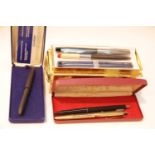 Three mixed pen cases with contents including a Fisher Space pen. P&P Group 1 (£14+VAT for the first