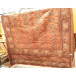 Large red ground woolen rug, 300 x 180 cm. This lot is not available for in-house P&P Condition