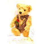 Steiff teddy bear Friday Brown with rose with certificate, serial no. 0458. P&P Group 1 (£14+VAT for