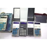 4x Sinclair Cambridge calculators including 1 basic model, 1 memory model and 2 scientific models.