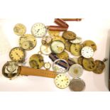 Tin of pocket watch parts, faces, movements etc. P&P Group 1 (£14+VAT for the first lot and £1+VAT