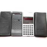 2x Sinclair Calculators including an Enterprise in silver and an Executive, both in slip cases. P&