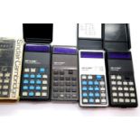 4X Sinclair Cambridge Calculators including 2x basic models, a memory model and a Scientific