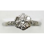 Ladies antique platinum seven stone daisy cluster ring, size P, 2.5g. P&P Group 1 (£14+VAT for the