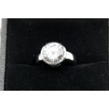Fiorelli silver and white stone ring, size J/K, boxed and in a gift bag. P&P Group 1 (£14+VAT for