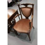 Antique shield back upholstered elbow chair. This lot is not available for in-house P&P
