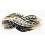 9ct white gold ring set with 0.2ct of black and white diamonds. 2.9g, size P. P&P Group 1 (£14+VAT