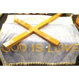 Large wooden processional cross and two religious banners. This lot is not available for in-house