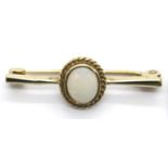 Ladies 9ct gold and opal brooch. L: 3cm, P&P Group 1 (£14+VAT for the first lot and £1+VAT for