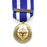 Boxed United Nations medal with ISAF bar. P&P Group 1 (£14+VAT for the first lot and £1+VAT for