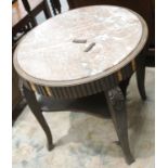 Early 19th century French Provincial oak circular table with inset rouge marble top, carved cabriole