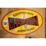 Cast iron Champion Spark Plug sign, L: 28 cm. P&P Group 2 (£18+VAT for the first lot and £3+VAT