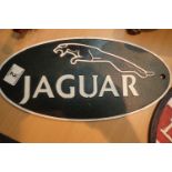 Cast iron Jaguar sign, W: 35 cm. P&P Group 2 (£18+VAT for the first lot and £3+VAT for subsequent