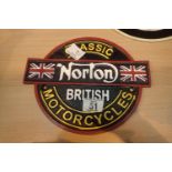 Cast iron black Manx Norton sign, D: 25 cm. P&P Group 2 (£18+VAT for the first lot and £3+VAT for