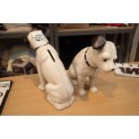 Two cast iron Nipper dog moneyboxes, H: 15 cm. P&P Group 2 (£18+VAT for the first lot and £3+VAT for