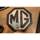 Cast iron grey MG sign, H: 22 cm. P&P Group 2 (£18+VAT for the first lot and £3+VAT for subsequent