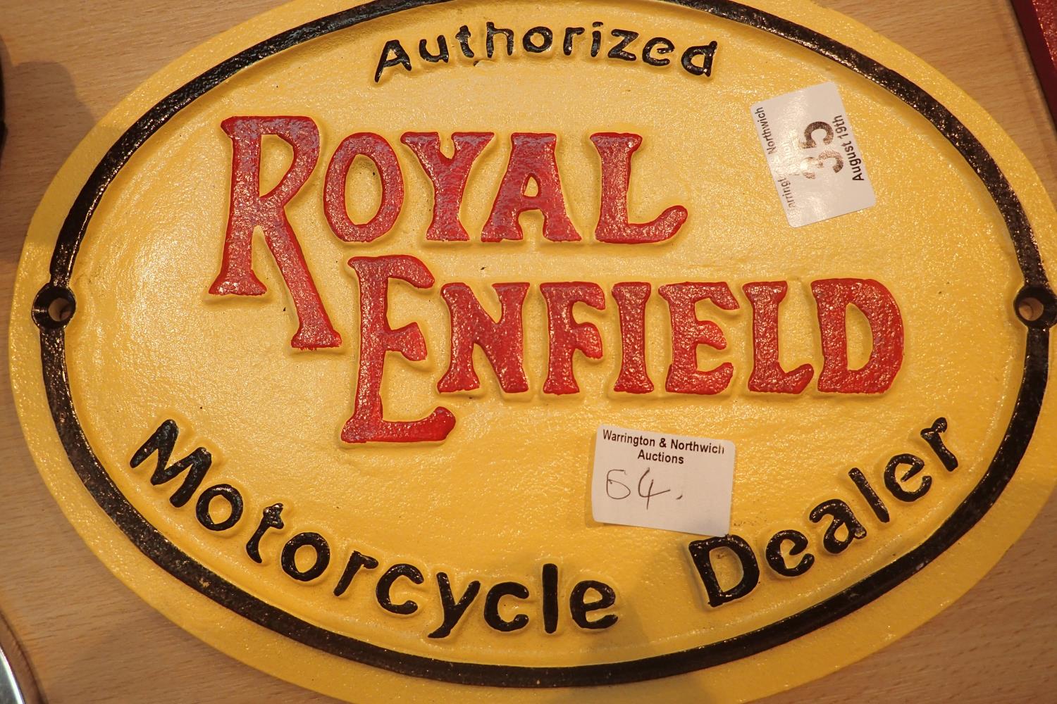 Cast iron Royal Enfield sign, L: 29 cm. P&P Group 2 (£18+VAT for the first lot and £3+VAT for