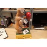 Cast iron dog boxing figurine with moving arms, H: 18 cm. P&P Group 2 (£18+VAT for the first lot and