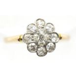 Late 19th / early 20th century 18ct gold diamond cocktail ring, the flower head set with 12