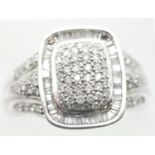14ct white gold diamond set cocktail ring, size Q/R, 7.2g. P&P Group 1 (£14+VAT for the first lot