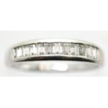 950 platinum CZ set half eternity ring, size V, 5.1g. P&P Group 1 (£14+VAT for the first lot and £