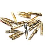Twenty one 14k gold used pen nibs. 8.7g P&P group 1 (£14 for the first lot and £1 for subsequent