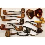 Leather cased briar two section pipe with a hallmarked silver collar, together with a collection