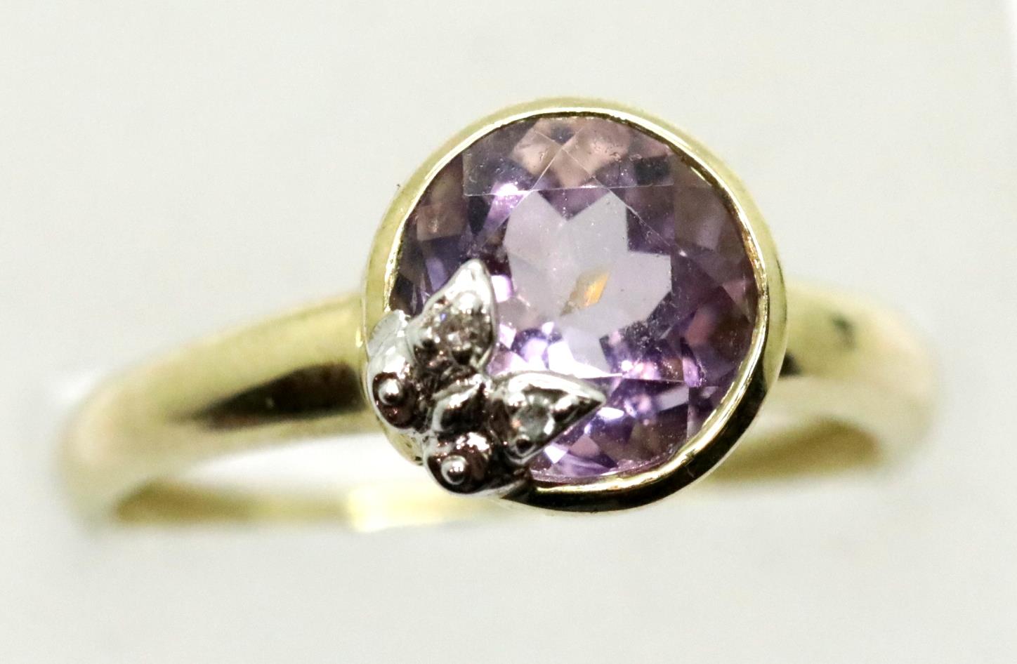 9ct gold amethyst solitaire ring, surmounted with diamonds, size O/P, 2.7g. P&P Group 1 (£14+VAT for