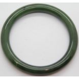 Jade bangle. Exterior 7.5cm Interior 6cm P&P Group 1 (£14+VAT for the first lot and £1+VAT for