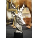 Chrome stags head on marble base, H: 33 cm. P&P Group 3 (£25+VAT for the first lot and £5+VAT for