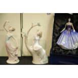 Two large boxed Nao figurines and a boxed Royal Doulton lady, P&P group 3 (£25 for the first lot and