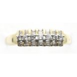 9ct gold diamond track set ring, size P, 1.8g. P&P Group 1 (£14+VAT for the first lot and £1+VAT for