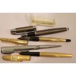 Pens to include Sheaffer, Parker 45, Parker 65 and a Ronson lighter and pen combination. P&P Group 1