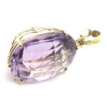 9ct gold mounted large amethyst pendant, L: 4 cm, 9.4g. P&P Group 1 (£14+VAT for the first lot