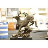 Bronze stag on marble base signed, H: 29 cm approximately. P&P Group 3 (£25+VAT for the first lot