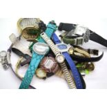 A large amount of ladies fashion wristwatches, names to include Gossip, Strada, Marcel Drucker and