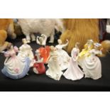 Collection of nine Royal Doulton lady figurines, various HN numbers. This lot is not available for