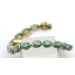 Gold washed silver emerald set bracelet, L: 18 cm, 12g. P&P Group 1 (£14+VAT for the first lot
