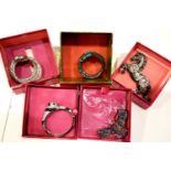 Three boxed Butler and Wilson bangles and two boxed brooches. P&P Group 1 (£14+VAT for the first lot