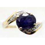 9ct gold blue stone and diamond set ring, size J, 2.5g. P&P Group 1 (£14+VAT for the first lot