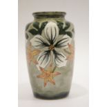 Small flower decorated Moorcroft vase H: 12 cm, P&P Group 1 (£14+VAT for the first lot and £1+VAT