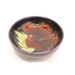 Small Moorcroft pin dish in the Anemone pattern, D: 10 cm. P&P Group 1 (£14+VAT for the first lot