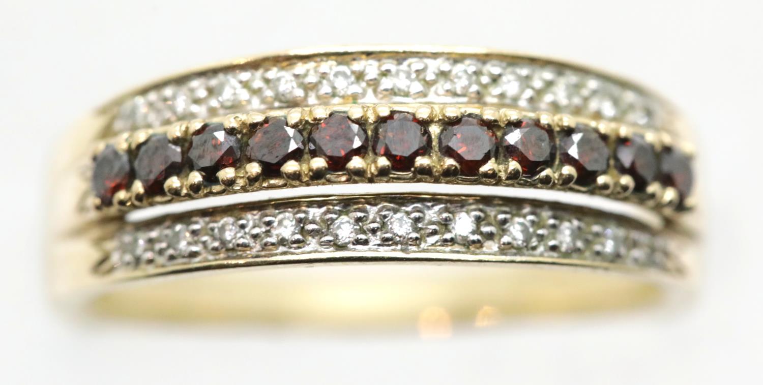 9ct gold red and clear diamond set ring, size P, 4.2g. P&P Group 1 (£14+VAT for the first lot and £