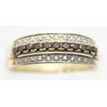 9ct gold red and clear diamond set ring, size P, 4.2g. P&P Group 1 (£14+VAT for the first lot and £