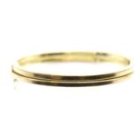 Italian 9ct yellow gold bangle, 10.2g, D: 5.5 cm approximately. P&P Group 1 (£14+VAT for the first