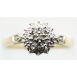 Presumed 9ct gold diamond set flower head cluster ring, size Q/R, 2.5g. P&P Group 1 (£14+VAT for the