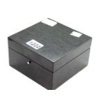 Contemporary black lacquered fitted watch box, 15 x 15 x 9 cm. P&P Group 1 (£14+VAT for the first