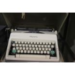 Cased Olympia vintage typewriter, This lot is not available for in-house P&P.