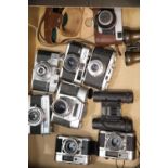 Box of assorted cameras. This lot is not available for in-house P&P.